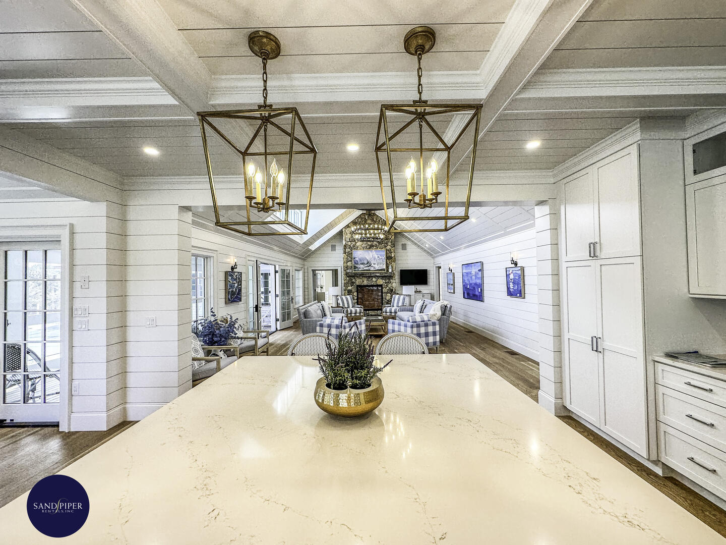 View from Gourmet Kitchen Looking Towards Living Room with Fieldstone Fireplace