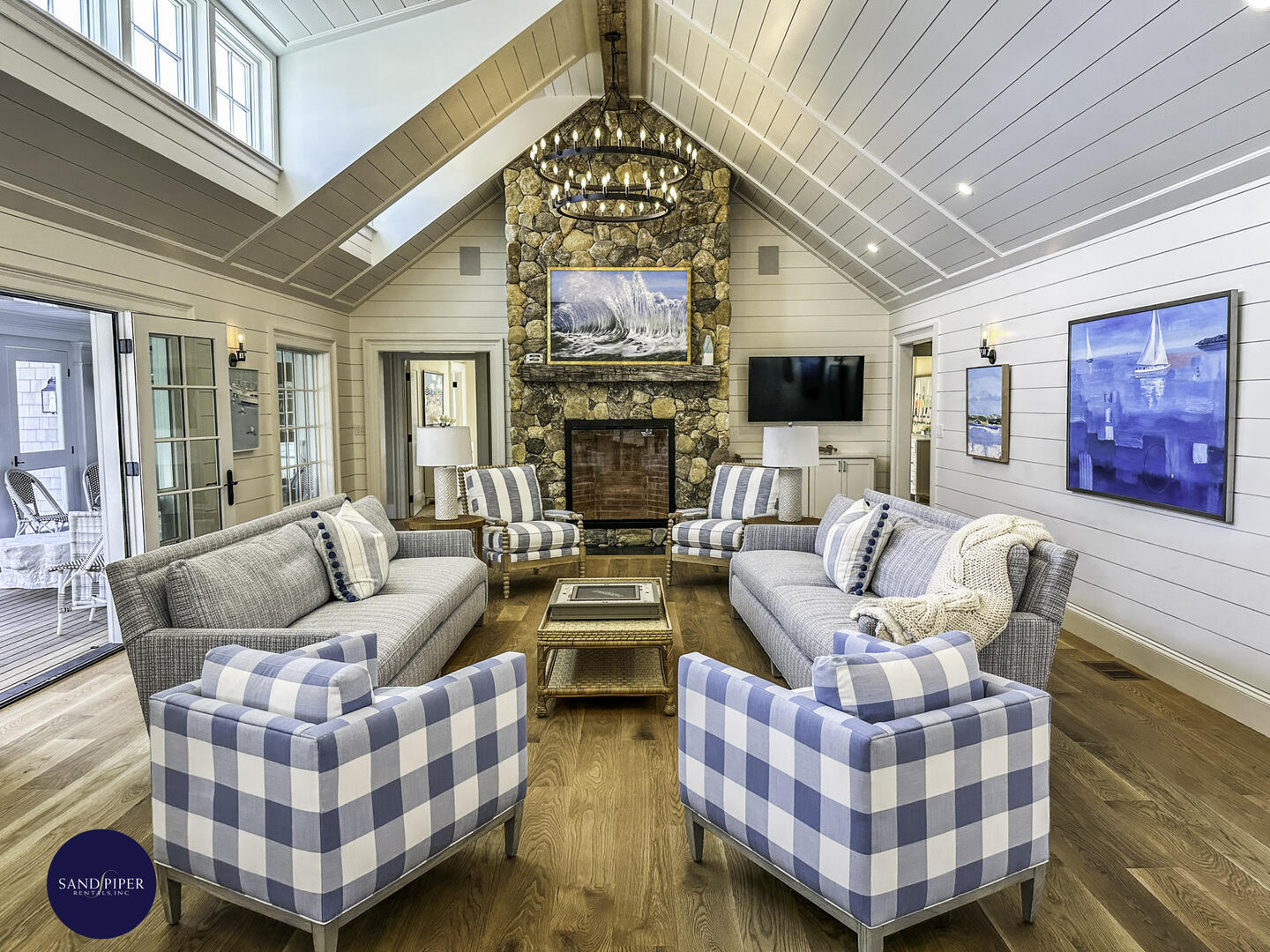 Living Room with Fieldstone Fireplace and Vaulted Ceilings, French Doors to Patio Pool Area