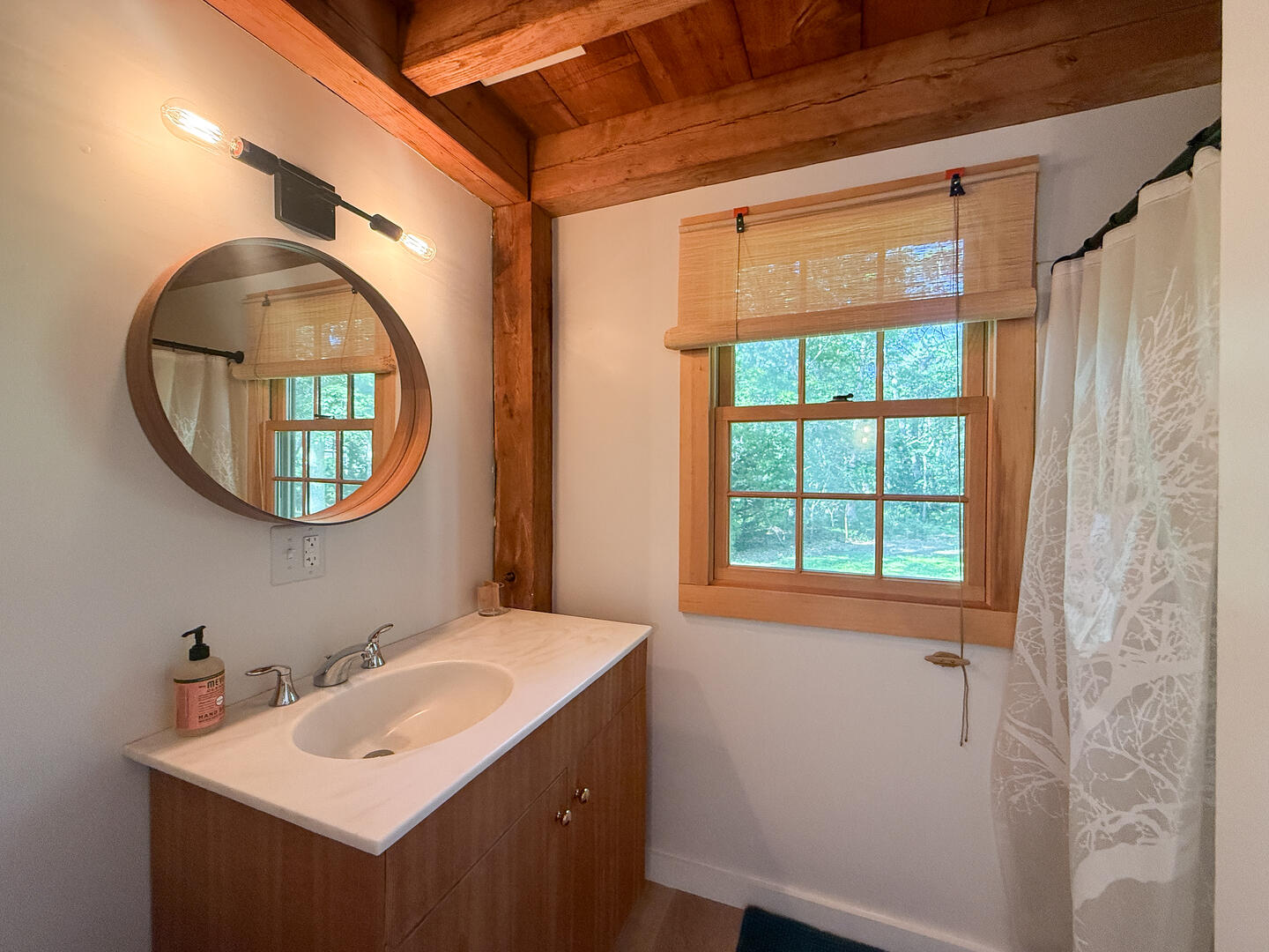 Hall Bath/Laundry with a Shower Stall, First Floor