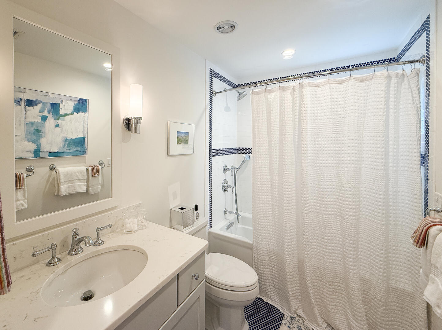Hall Bath with a Shower Tub Combo, Second Floor