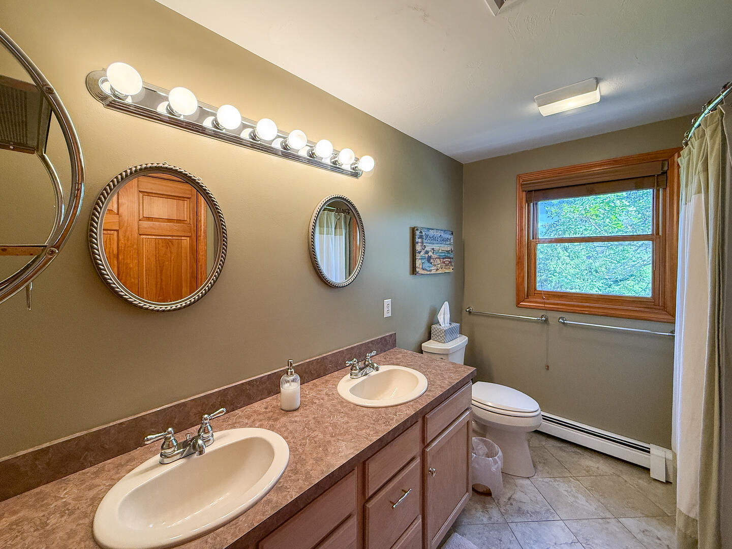 Hall Bath with a Shower Tub Combo, Second Floor