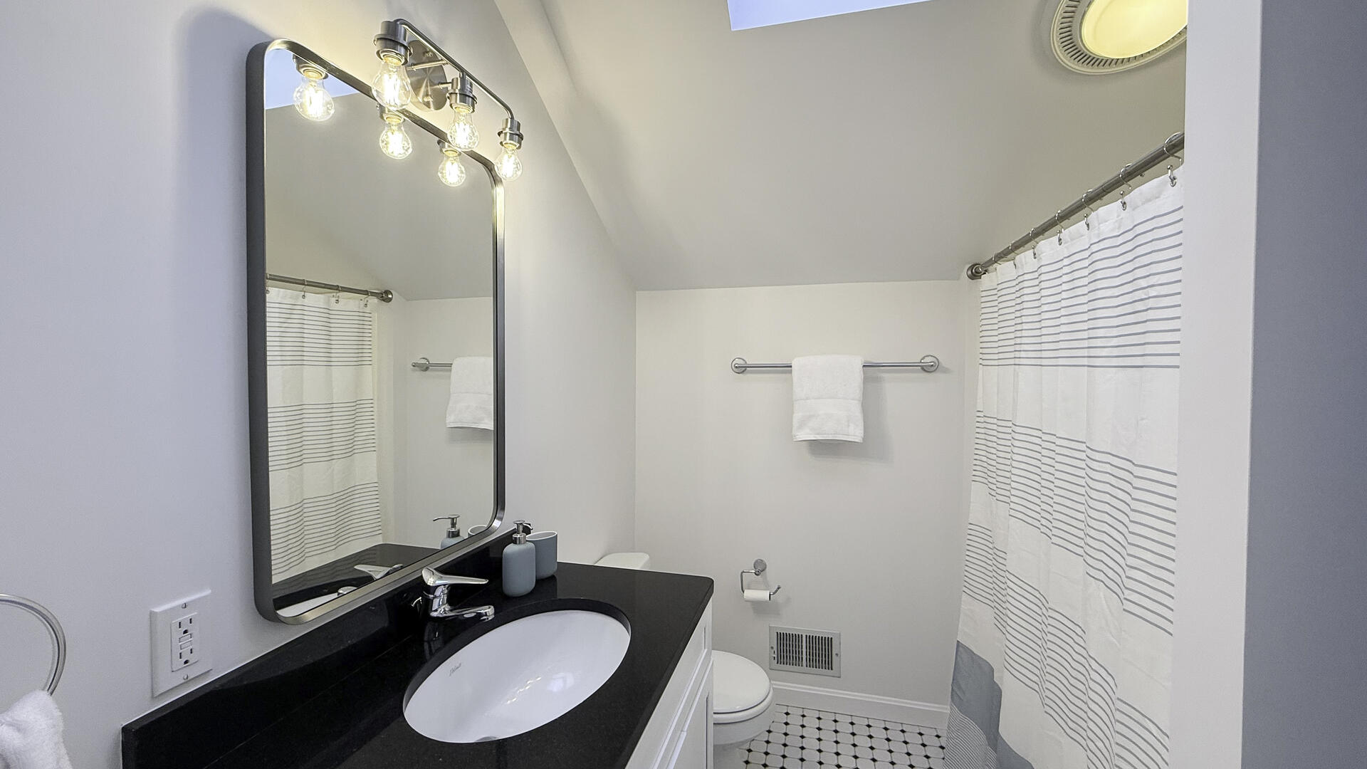 BR1 Adjoining Hall Bath with Shower Tub Combo, Second Floor