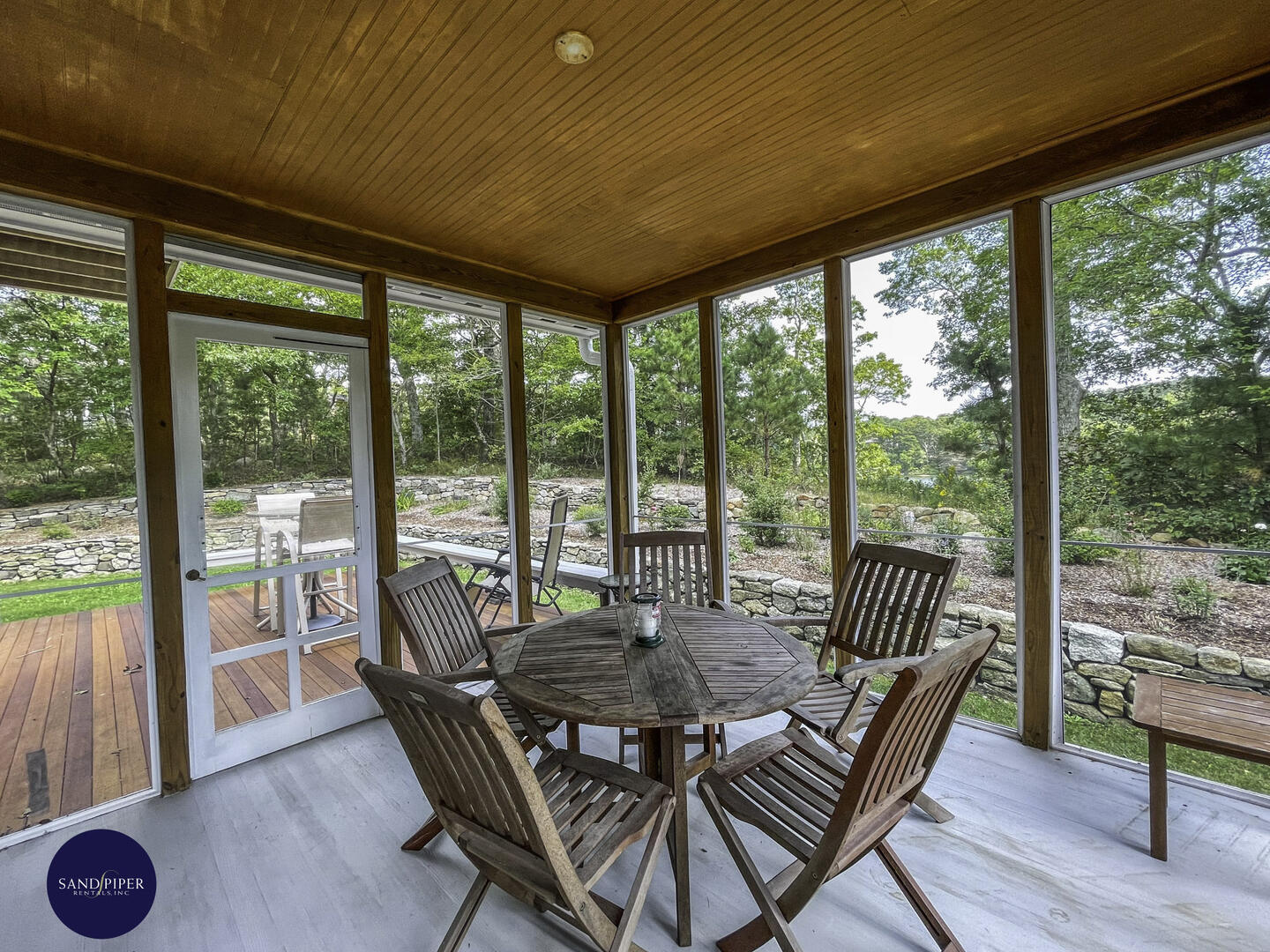 Screened porch off dining area