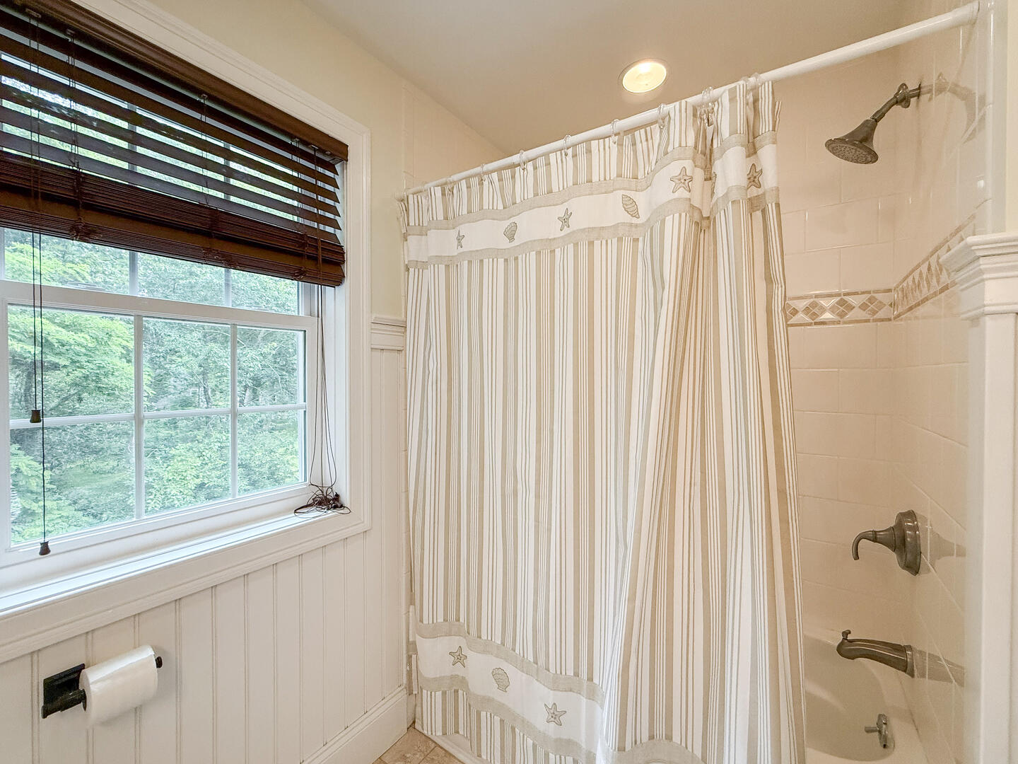 Hall Bath with a Shower Tub Combo, Second Floor