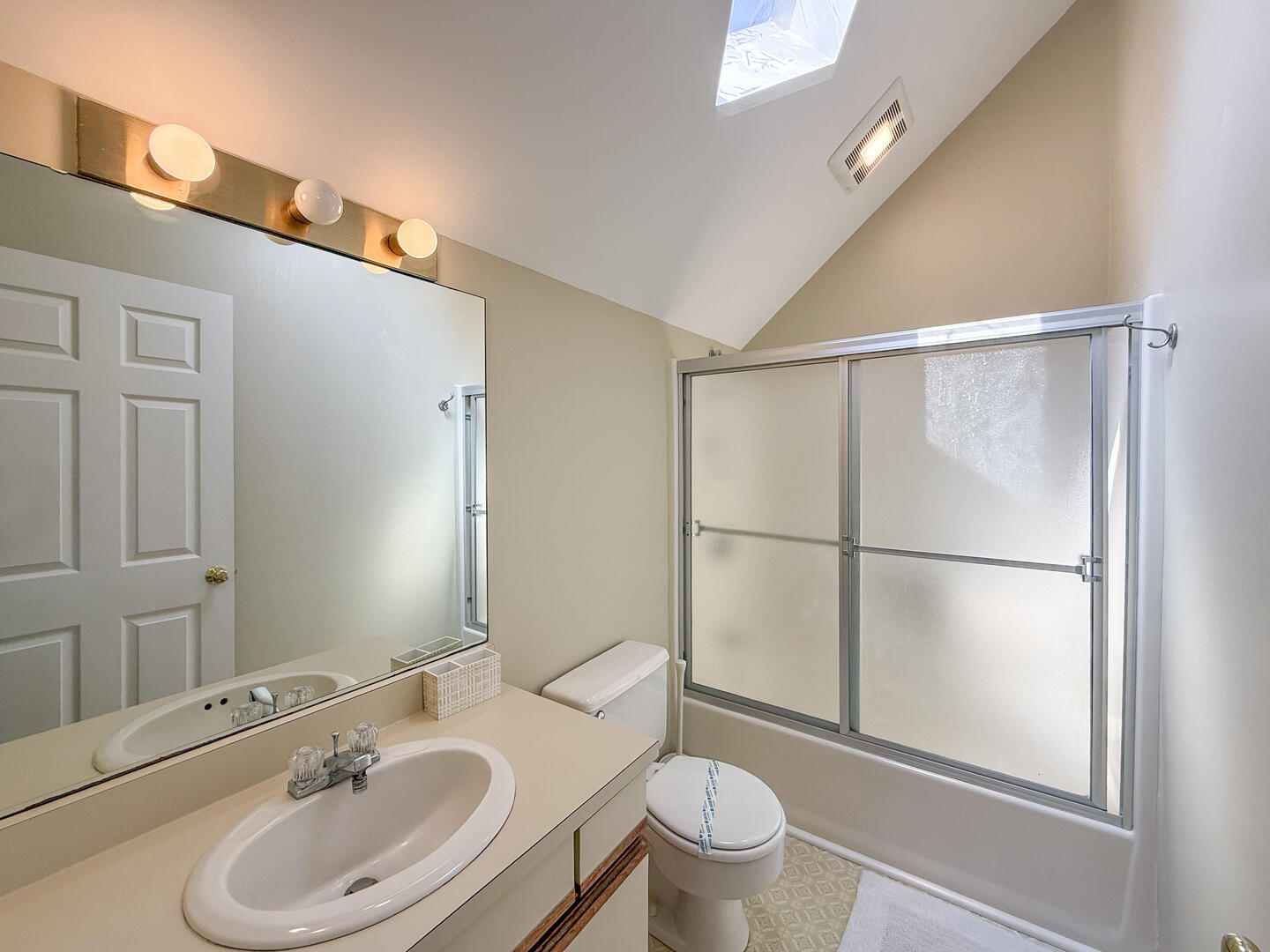 Hall Bath with a Shower Tub Combo, Second Floor
