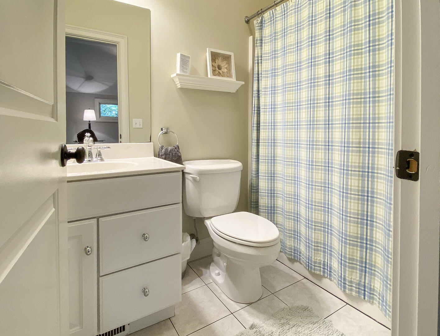 Hall Bath with a Shower Tub Combo, Second Floor