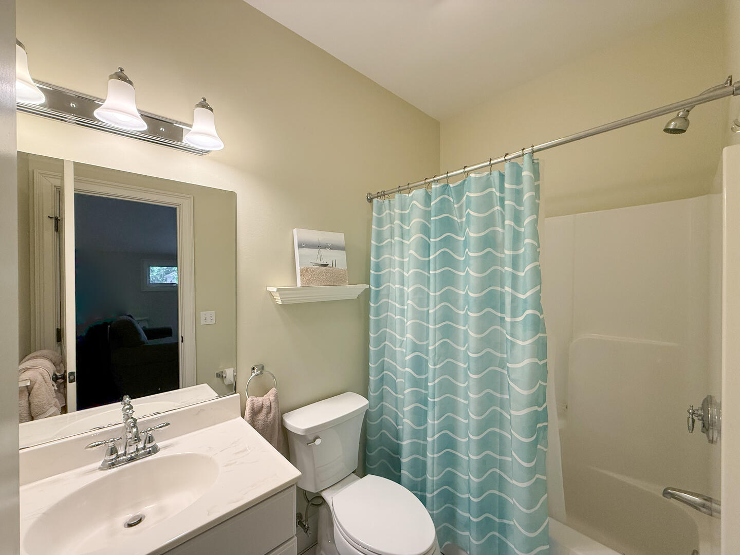 Hall Bath with a Shower Tub Combo, Second Floor