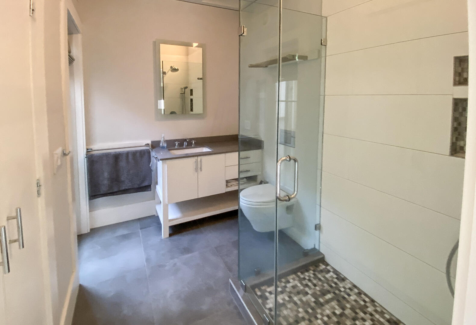 BR1 Adjoining Hall Bath with a Shower Stall, First Floor