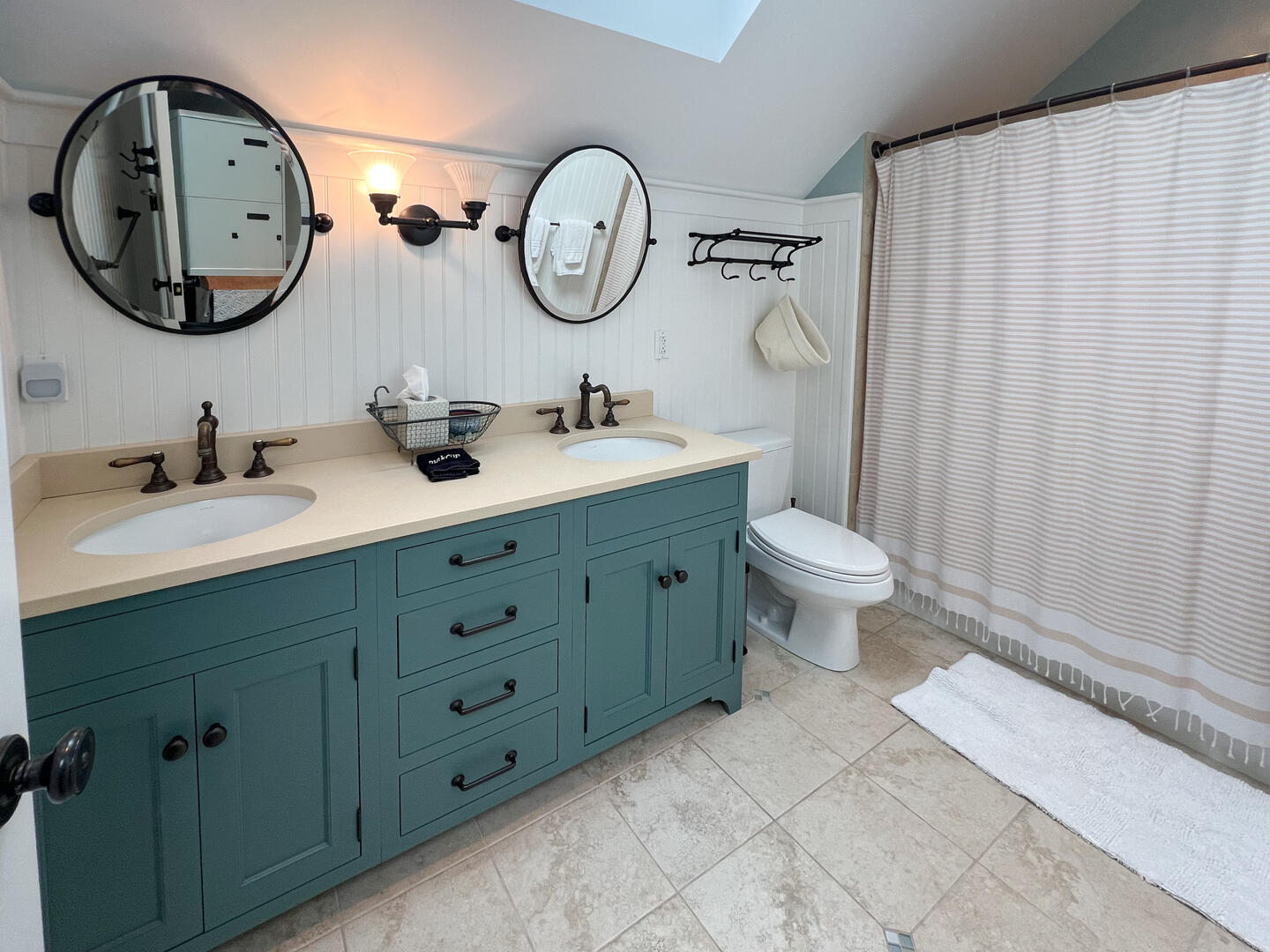 Hall Bath with a Shower Tub Combo, Second Floor
