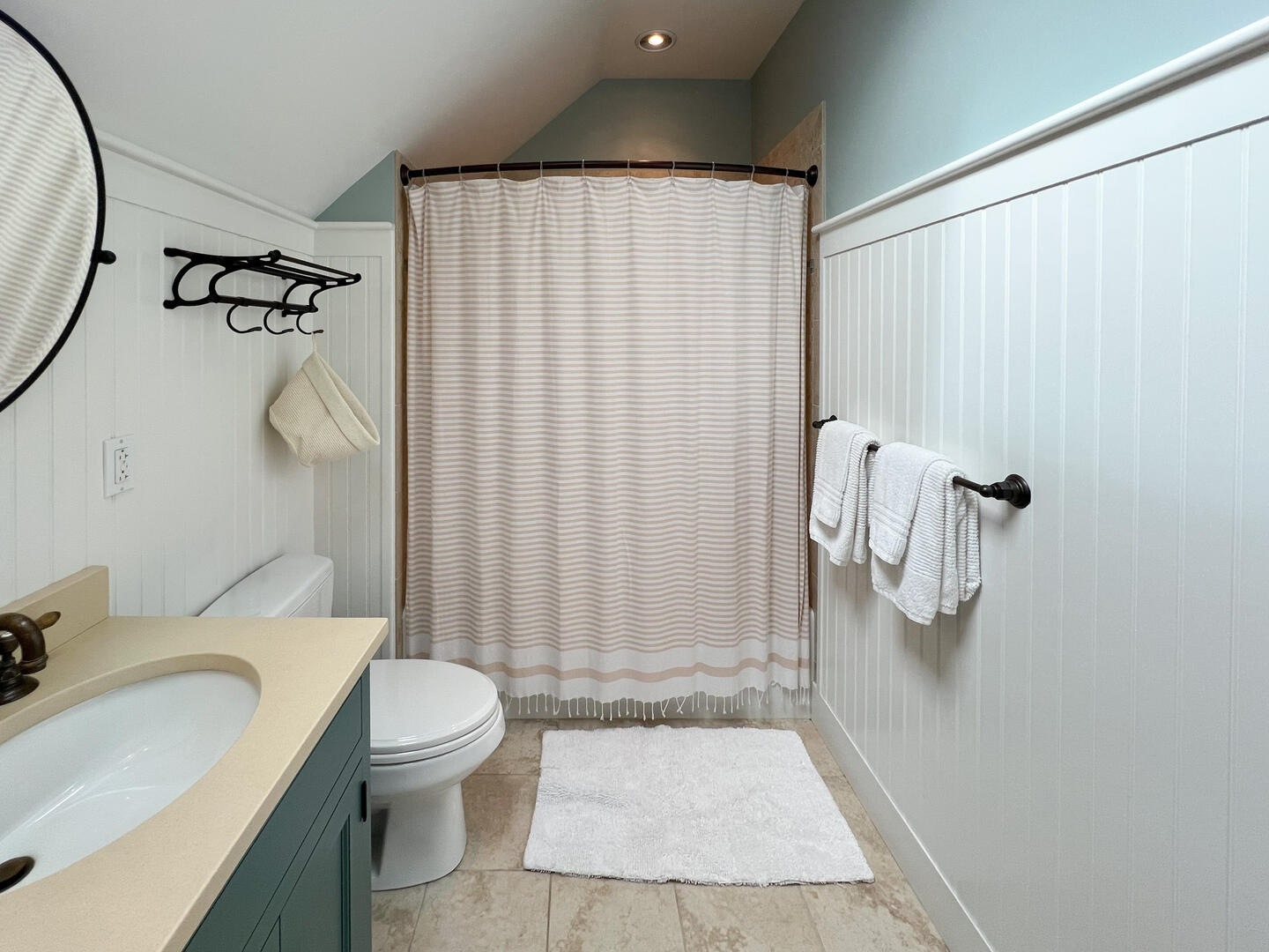 Hall Bath with a Shower Tub Combo, Second Floor