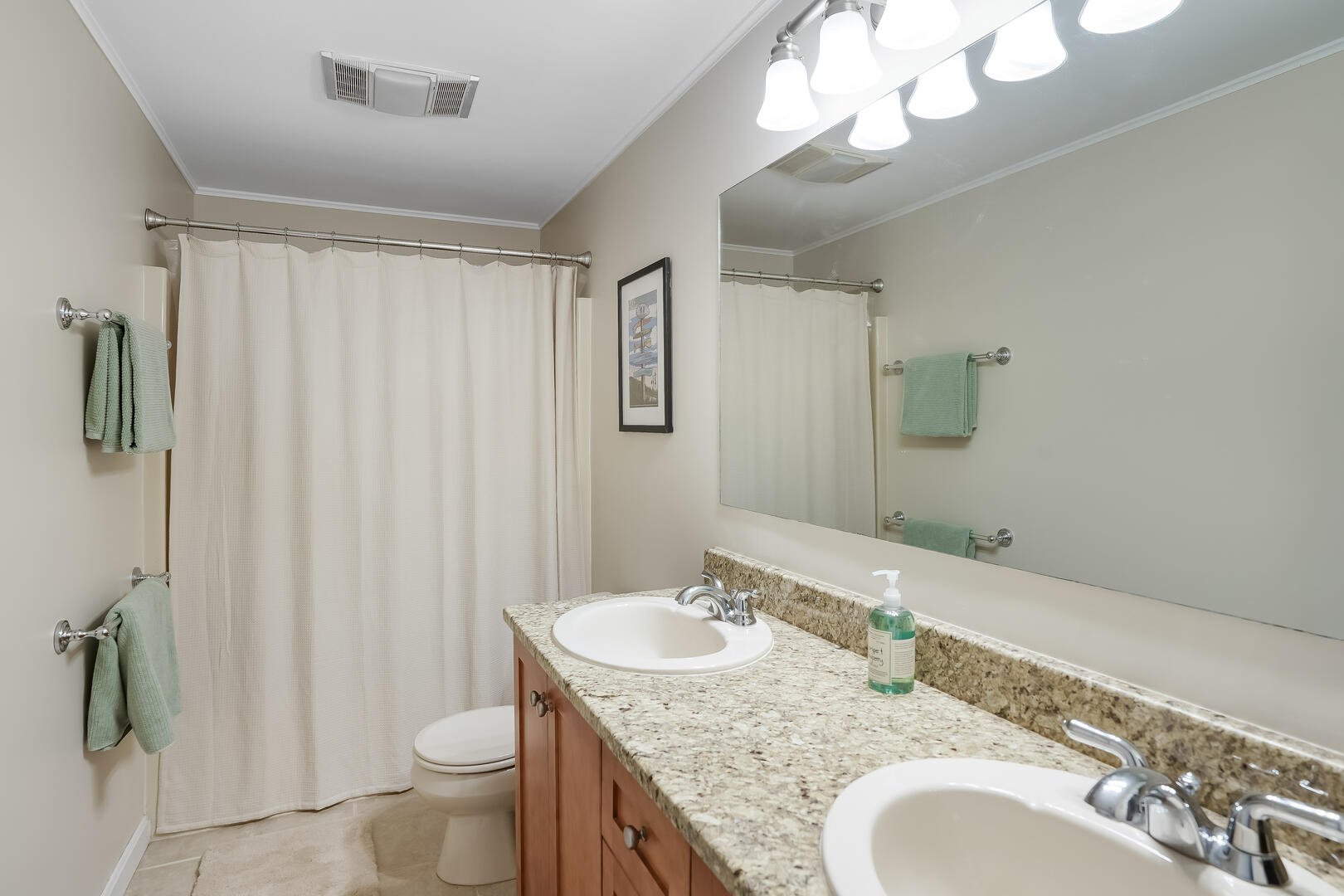 Hall Bath with a Shower Tub Combo, Second Floor