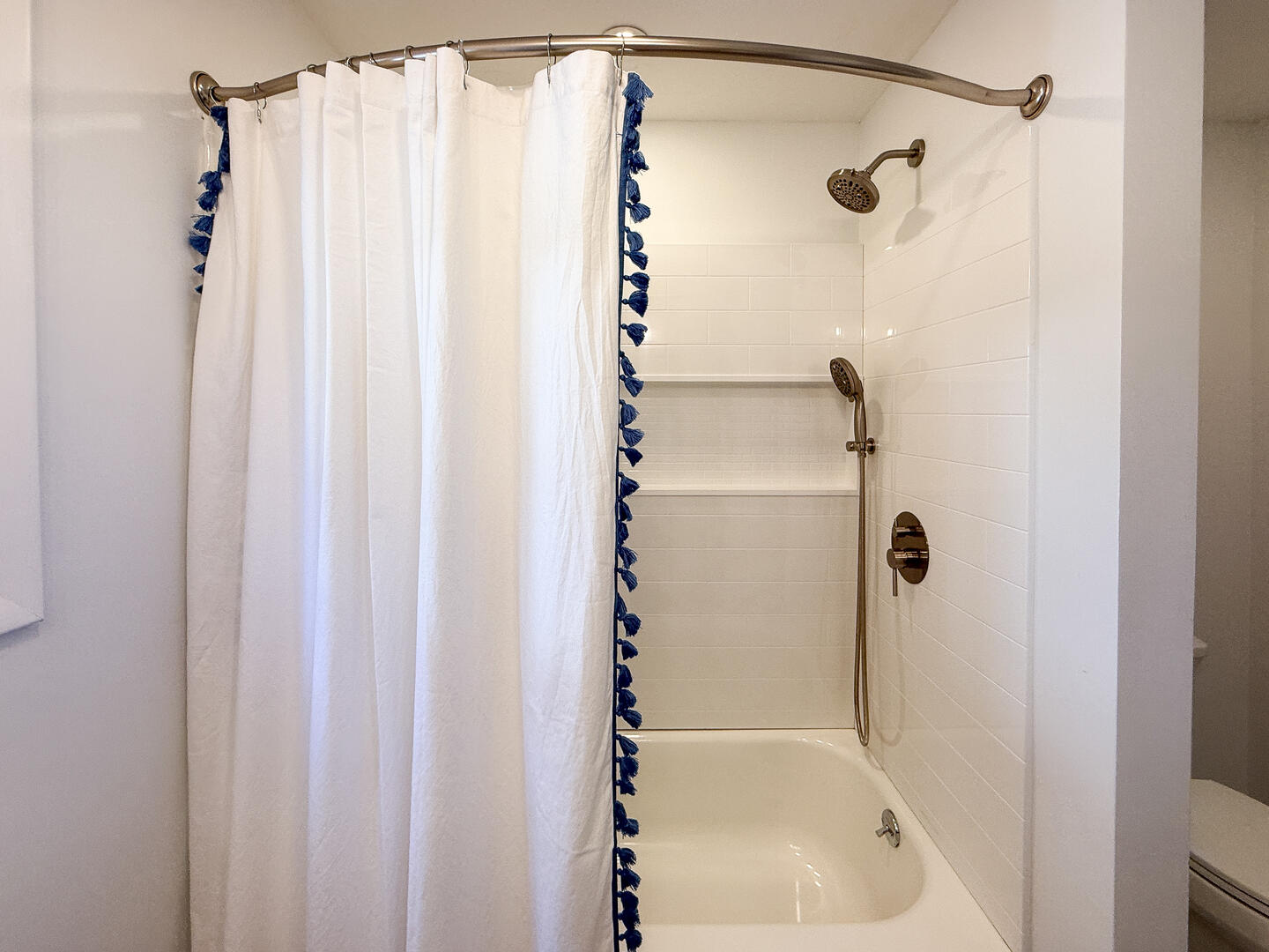 Hall Bath with a Shower Tub Combo, First Floor