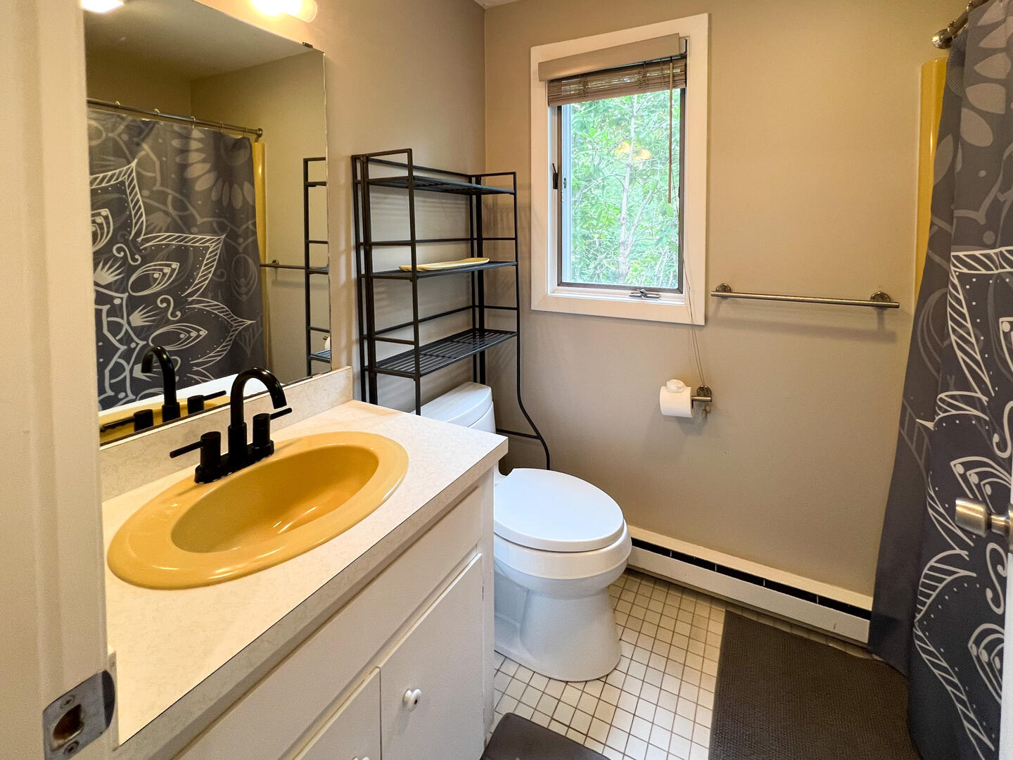 Hall Bath with a Shower Tub Combo, Main Level