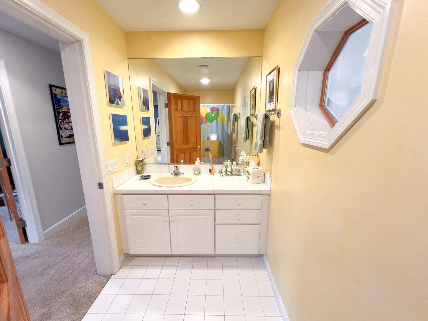 Hall Bath with a Shower Tub Combo, Second Floor