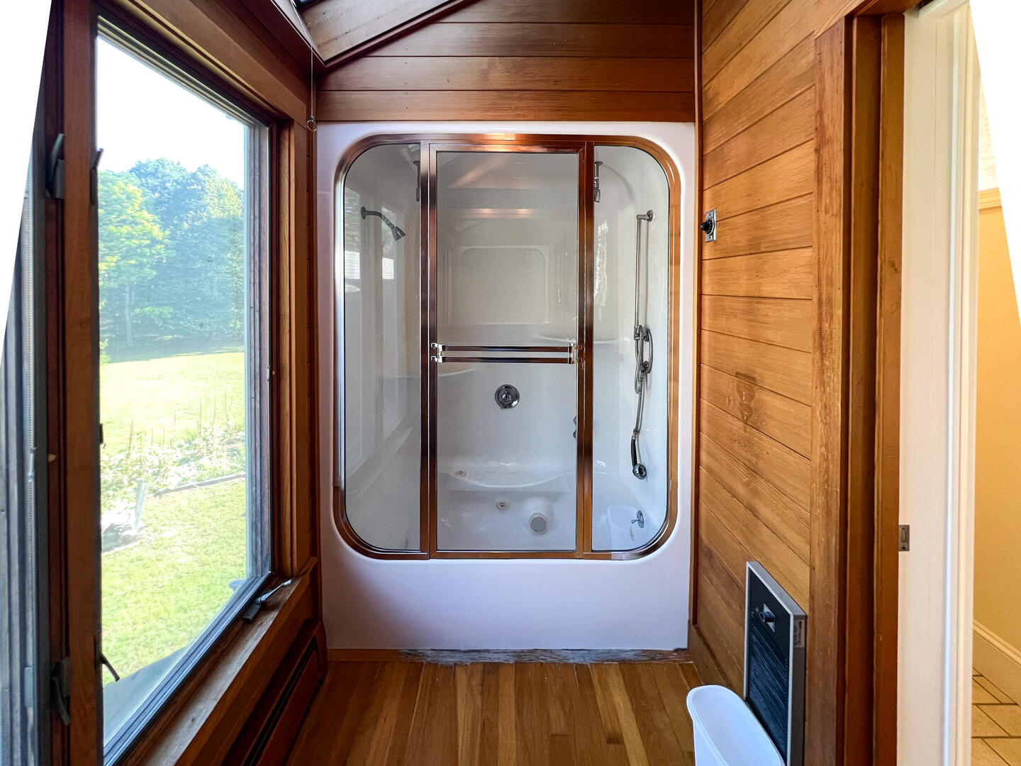 Hall Bath with a Shower Tub Combo, Second Floor