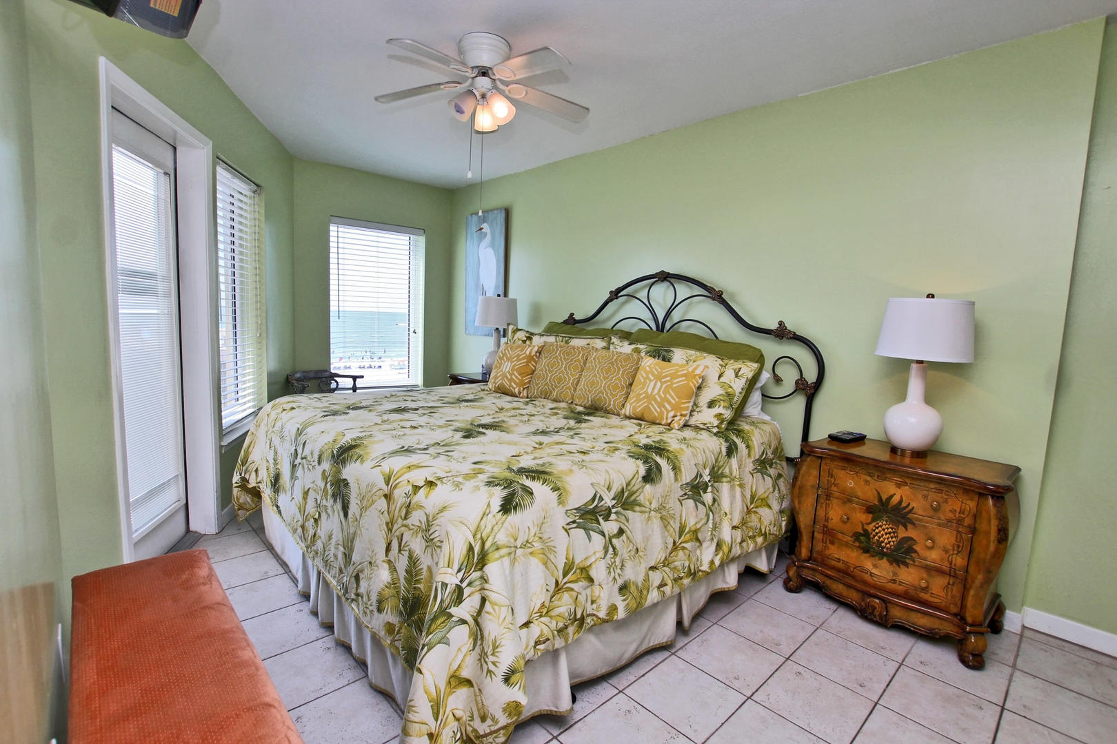 Beach Front Master Bedroom with a Wrought Iron King Bed